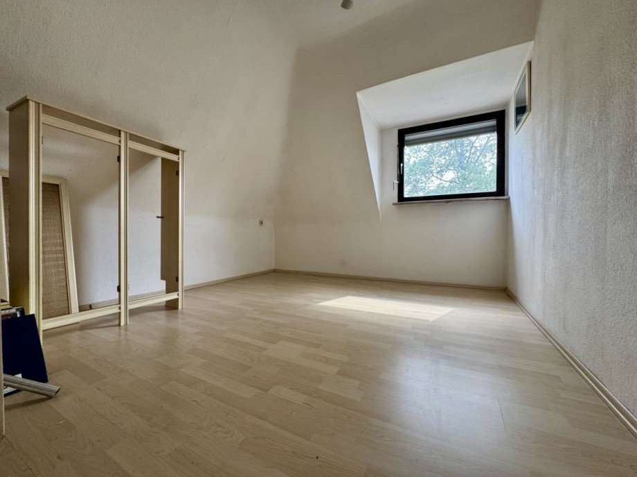 Schlafen DG Mehrfamilienhaus Langen