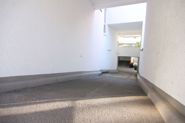 Tiefgarageneinfahrt Etagenwohnung Langen